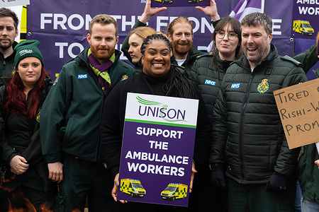 Labour MP Bell Ribeiro Addy (C) demonstrates with ambulance workers outside Waterloo Ambulance Station. Unison members of the LAS (London Ambulance Service) walked out for 12 hours from 11 am on Wednesday, Jan 11, to demonstrate for better pay and to rally support for ambulance workers.
