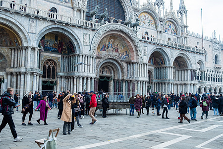 Locals and tourists are seen in St. Marco square in front of the St. Marco Basilica. After the pandemic years, tourists have begun to throng the streets of Venice once again, with the number of tourists exceeding 10 millions in 2022.