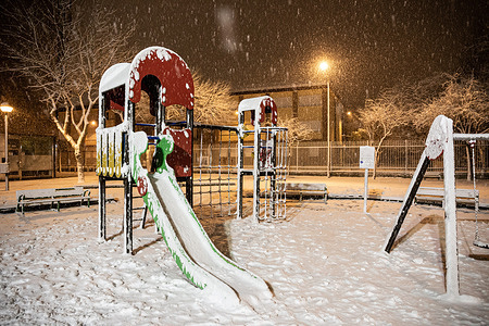 A children's park is seen covered in snow during the Fien storm. The Fien squall as it passed through Burgos today covered the northern half of the peninsula with snow, hindering traffic on more than a hundred roads, especially trucks.