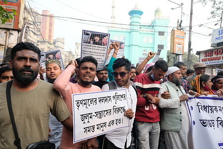 Indian Secular Front (ISF) supporters holding placards march on the street during the protest against the arrest of the party leader Naushad Siddiqui and 17 workers following a clash with police on 21st January.