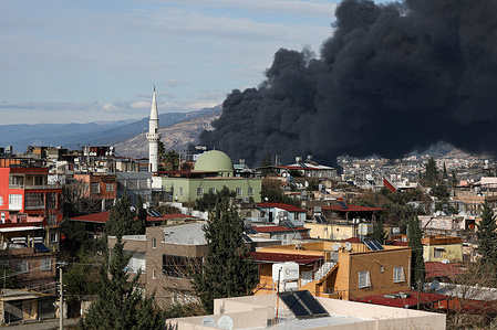 Black smoke rises from a fire caused by the earthquake seen the Iskenderun Port. Turkey experienced the biggest earthquake of this century in the border region with Syria. The earthquake was measured 7.7 magnitudes. In Hatay, one of the cities where the earthquake was experienced, a fire broke out in Iskenderun Port due to the earthquake.
