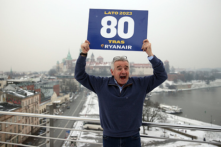 Ryanair’s Group CEO Michael O’Leary holds a card celebrating Ryanair's 80 routes in Poland during a press conference at Kossak Hotel.
