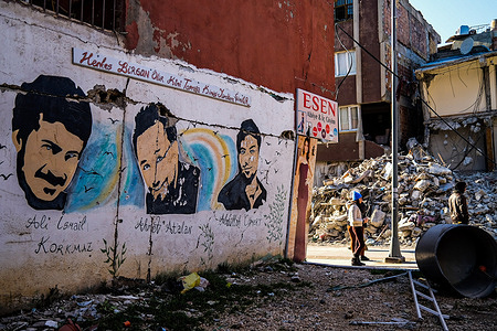 The mural of the symbolic names of the Gezi Park Resistance, Ali İsmail Korkmaz, Abdullah Cömert and Ahmet Atakan, seen on a wall near earthquake damaged buildings. Turkey and Syria have experienced the worst earthquakes to strike the region in almost a century. A 7.8-magnitude quake struck southeastern Turkey, which was followed by a second quake of 7.7 in northern Syria. More than 30,000 people are reported to have died due to the quakes, and the death toll is still rising.