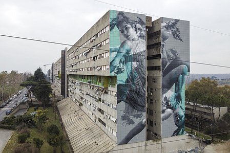 (EDITORS NOTE: Image taken with a drone)
A 40-metre-long mural created by the Dutch street artist JDL (alter ego of the artist Judith de Leeuw) on a wall of the Corviale, a 958-metre-long public housing building (also called " the great serpent" due to its shape) in Rome. The subject draws inspiration from the myth of Icarus, a metaphor for a society intent on following a path that pays little attention to the precarious fate of the climate and the environment, leading it to self-destruction.