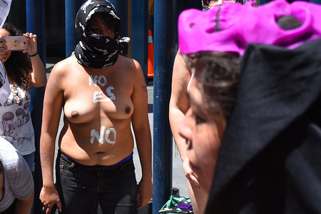 (EDITORS NOTE: Image contains nudity.)
A topless female protester at the march. Hundreds of females took to the street in a march to protest the recent murder of the student Mara Castilla, she was raped and murdered by a driver of the Taxi service Cabify and the femicides.