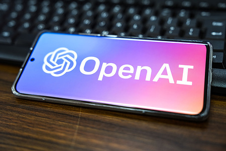 In this photo illustration, an OpenAI logo is displayed on the screen of a smartphone.