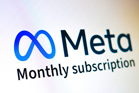 In this photo illustration, the Meta Platforms logo and the words "Monthly subscription" is seen displayed.