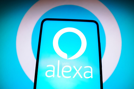 In this photo illustration, the Amazon Alexa logo is seen displayed on a smartphone.