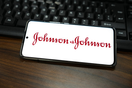 In this photo illustration, a Johnson & Johnson logo is displayed on the screen of a smartphone.