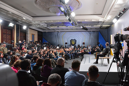 A view of a room with journalists during a press conference by the President of Ukraine, Volodymyr Zelensky, as Ukraine marks one year since the large-scale invasion of Russia. Ukrainian President Volodymyr Zelenskyy held a press conference in Kyiv on the first anniversary of the Russian invasion of Ukraine. The Ukrainian President has largely remained in Kyiv since Russia launched its full-scale attack one year ago, making occasional visits to troops in frontline areas and a few high-profile trips to allied countries to lobby for military aid.
