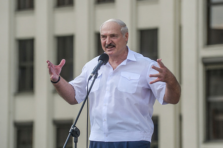 Belarusian President Alexander Lukashenko gestures while speaking to his supporters during a rally in Independence Square.