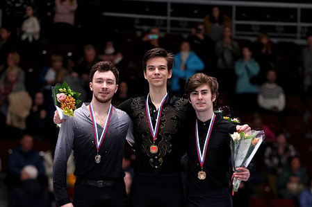 Petr Gumennik (C), Dmitri Aliev (L), Mark Kondratyuk (R) at the award ceremony for Men in figure skating, in the Final of the Grand Prix of Russia in Figure Skating 2023, which took place in St. Petersburg, in the sports complex "Jubilee".