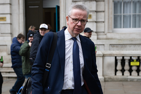 Levelling Up Secretary Michael Gove is seen outside the Cabinet Office in London.