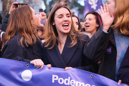 Minister of Equality, Irene Montero chants slogans during a demonstration marking the International Women's Day in Madrid. To mark International Women's Day, capitals across the world are hosting marches, rallies, and demonstrations, including Madrid, where broad tree-lined boulevards are packed with a sea of protesters.