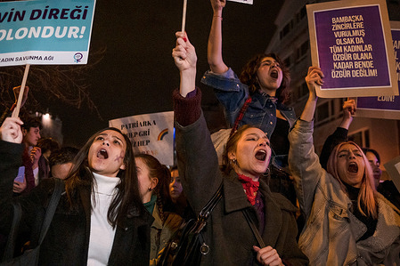 Women chant slogans while holding placards during the demonstration. Thousands of women came together and organized a march on March 8, International Women's Day. The women, who came together on Sakarya Street at the call of the 17th Feminist Night March Organization, unfurled a banner "Our rebellion exceeds our mourning, women's solidarity lives". Women also protested the violence against women in Turkey with applause and slogans.