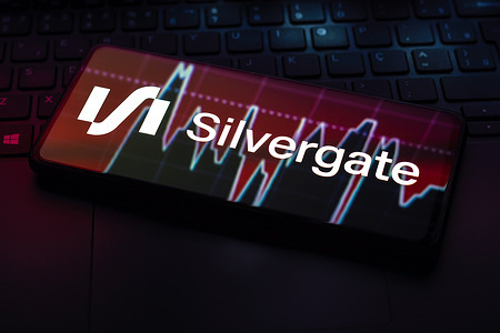 In this photo illustration, the Silvergate logo seen displayed on a smartphone.