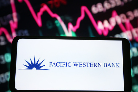 In this photo illustration, Pacific Western Bank logo is seen on a smartphone screen.