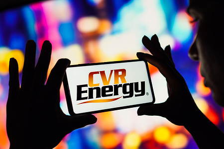 In this photo illustration, the CVR Energy logo seen displayed on a smartphone.