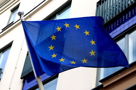 Flag of the European Union (Schengen area) on the building of the Consulate General of the Republic of Finland in Saint Petersburg, Russian Federation.