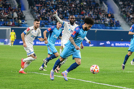Claudio Luiz Rodrigues Parise Leonel, commonly known as Claudinho (No.8) of Zenit and Dmitri Skopintsev (No.7), Moumi Nicolas Brice Ngamaleu (No.13) of Dynamo in action during the Russian Cup 2022/2023 football match between Zenit Saint Petersburg and Dynamo Moscow at Gazprom Arena. Final score; Zenit 1:1 Dynamo (4:5, penalty shootout).