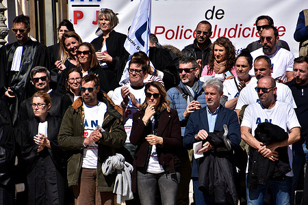 Protesters gather on the steps of the courthouse during the demonstration. Magistrates, lawyers and police gathered on the steps of the Marseille courthouse to protest against the reform of the judicial police.