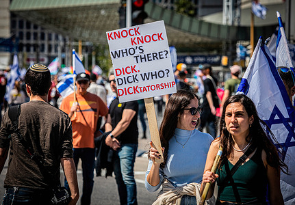 (EDITOR'S NOTE: Image depicts profanity)
Anti-reform protesters take part during the demonstration. Israeli protesters held demonstrations against the proposed judiciary overhaul plan under the government of Prime Minister Benjamin Netanyahu. Israeli fears that it would give Netanyahu control over judicial appointments.