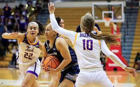 Monmouth Hawks guard Bri Tinsley (L2) drives to the basket against Tennessee Tech during an NCAA women's basketball tournament game at Simon Skjodt Assembly Hall in Bloomington.
 Tennessee Tech beat Monmouth 79-69.