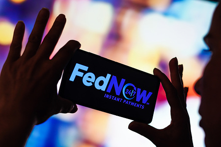 In this photo illustration the FedNow Service (Instant Payments) logo seen displayed on a smartphone.