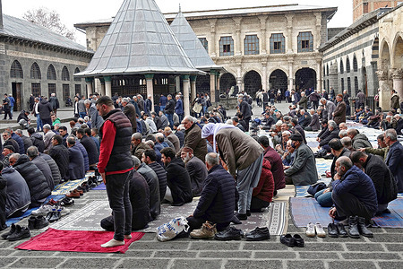 Muslims perform prayers at the back of the mosque. About 50 thousand people who died in the severe earthquakes that occurred on February 6 in 10 provinces of Turkey were commemorated with a religious ceremony held in Diyarbakir. The Mawlid is a long poem read for the deceased as prayers were offered during the Friday prayers. In the Turkish and Kurdish Islamic tradition, Muslims of Turkey recite Mawlid on the 40th day of the death of the victims.