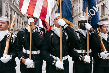 Members of US Navy participate in the annual St. Patrick's Day Parade in New York City. New York's Saint Patrick's Day Parade is the largest in the world.