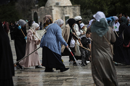 People seen cleaning at the Al-Aqsa Mosque, ahead of the holy Islamic fasting month of Ramadan in Jerusalem. The month of Ramadan is considered distinct among Muslims and has a special status from the rest of the months of the Hijri year. It is the month of fasting, which is considered one of the pillars of Islam, during which Muslims refrain (except for those who have a valid excuse) from food and drink, as well as from a group of prohibitions that nullify fasting from dawn. And until sunset.