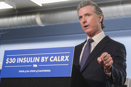 California Gov. Gavin Newsom speaks in a news conference after visiting a Kaiser Permanente warehouse in Downey, California. Newsom announced a partnership with Civica Rx to provide insulin to Californians for $30 for 10 milliliters, which he said was as little as one-tenth of the current cost.
