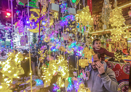 Shops selling lanterns in preparation for the holy month of Ramadan in a market. Muslims worldwide celebrate the holy month by praying and reciting the Qur'an as they fast from eating, drinking, smoking, and all sexual relations from dawn to dusk.