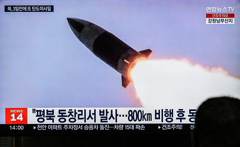 A TV screen at the Yongsan Railway Station in Seoul, shows file footage of North Korea's missile launch during a news program. North Korea fired a short-range ballistic missile (SRBM) towards the East Sea on March 19, South Korea's military said, in yet another provocation in apparent protest over an ongoing South Korea-U.S. military exercise.
South Korea's military said it detected the launch from the Tongchang-ri area on the country's west coast at 11:05 am(KST). The area is home to the North's key long-range rocket launch site.