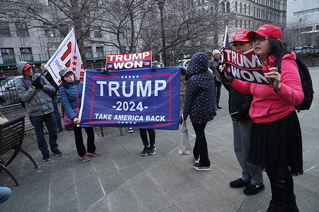 Pro Trump Protestors and media gather outside the Manhattan Criminal court after Grand Jury testimony from Bob Costello and Michael Cohen, both Michael Cohen's former lawyer and Donald Trump's present lawyer, preceeding the possible indictment of Donald Trump in the Stormy Daniels case, in New York City.