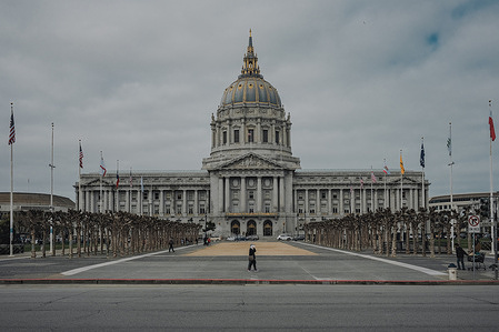 The front entrance to City Hall, which features a grand set of steps leading up to the building's main doors. The steps are lined with palm trees and other lush vegetation, adding to the building's grandeur and beauty. After two years of renovations, the iconic San Francisco City Hall has finally reopened its doors to the public since June 2021. The $550 million project aimed to restore the building's historical elements while modernizing it to meet the needs of the 21st century.

The project involved the restoration of the City Hall's iconic dome, which now boasts a new lighting system that can change colors to mark special events and holidays. The dome's intricate murals have also been restored to their original glory, along with the building's grand staircase and its historic furnishings.

In addition to the restoration work, the renovation project included upgrades to the building's infrastructure, including a new heating and cooling system, plumbing, and electrical systems. The building is now fully accessible to those with disabilities, and a new fire suppression system has been installed to enhance public safety.