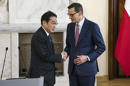 Polish Prime Minister Mateusz Morawiecki (R), welcomes Japanese Prime Minister Fumio Kishida (L) for a meeting in Warsaw. In Warsaw, Japanese Prime Minister Fumio Kishida met with Poland’s Prime Minister for talks about the region’s security and bilateral relations a day after he made a surprise visit to Kyiv.