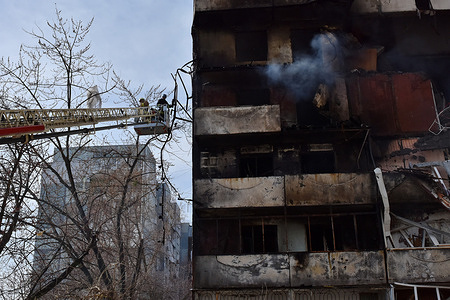 Firefighters put out a fire after a Russian missile hit a residential multi-story building in Zaporizhzhia. On 22 March at noon, the Russian forces launched six missiles at the city of Zaporizhzhia. One of them struck two apartment blocks standing next to each other. At least 33 people were injured, and one person died. There were three children among the injured victims.