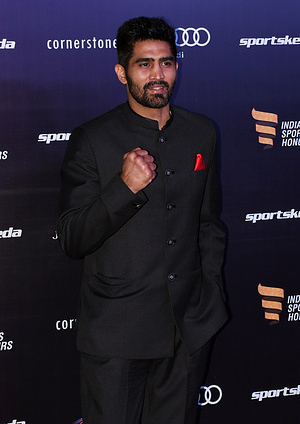 Indian boxer Vijender Singh Beniwal poses for a photo during the Indian Sports Honours red carpet in Mumbai. The award aims to reward excellence in various sports and nurture upcoming talents.