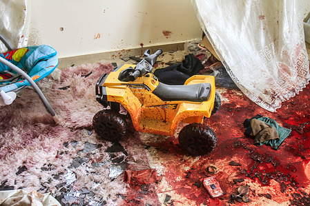 (EDITORS NOTE: Image contains graphic content)
A view of children's toys covered with blood inside the house of the Palestinian Amir Abu Khadija, which was riddled with bullet marks after the Israeli army stormed it and assassinated Amir, in the city of Tulkarm in the occupied West Bank. It is the first killing in the occupied West Bank during Ramadan so far, as the Israeli army claimed it targeted an armed suspect.