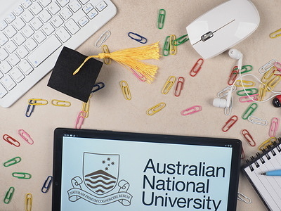 In this photo illustration, an Australian National University (ANU) logo seen displayed on a tablet.