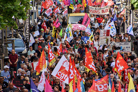 Protesters hold banners and flags during the demonstration. At the call of several unions and political parties, demonstrators marched on the streets of Marseille against the disputed pension reform of the French government. President Emmanuel Macron has enacted the reform with changes that should come into force before the end of this year 2023.