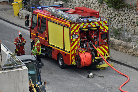 A fire truck is seen on the street near a gas leak in Marseille. Firefighters from the Bataillon des Marins-Pompiers de Marseille (BMPM) and emergency rescue teams from Gaz Réseau Distribution France (GRDF) respond to a gas leak in Marseille.