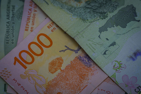 In this photo illustration, Argentina banknotes are displayed. With an annual 109% inflation rate, Argentina's Peso is worth less every day. April's inflation rate of 8,4% sets a new record, putting the country in fourth place in the world inflation ranking, with experts fearing the worst numbers are to come in the next month.