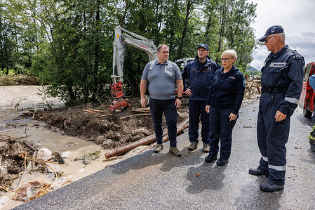 President of Slovenia Natasa Pirc Musar (2nd from right) visits flood-damaged areas near Kamnik. Clean-up and rescue efforts are underway after torrential rain and heavy flooding on August 5 in Slovenia. Some areas are still inaccessible, and people are still being evacuated.
