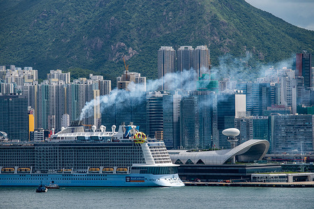 Royal Caribbean International's Spectrum of the Seas docks at the Kai Tak Cruise Terminal, releasing emissions into the adjacent area. With 18 cruise lines planning to visit Hong Kong and making hundreds of ship calls, the dockside emissions will affect the residents who live adjacent to these emitters of harmful pollutants.
