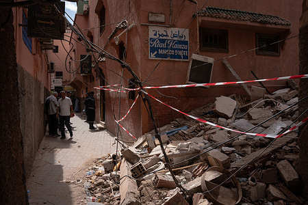 Rubble is seen in the alley near guest houses where tourists stay at the old town in Marrakesh. Local firefighters patrolling in the old town, Medina, a famous tourist area after the Moroccan earthquake happened last Friday. Signs of damage are still prominent and rubble is still not cleared from the area. Many locals feared the narrow alleys would result in mass casualties if the building collapsed, however tourists have returned and flocked to the once-quiet old town. The epicentre of the magnitude 7.2 quake struck in the high Atlas mountain, some 72 km southwest of Marrakesh. Almost 3,000 people are reported to have died in the earthquake.