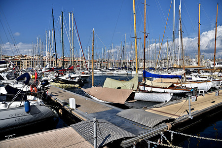 General view of sailboats moored in the Old Port of Marseille.
