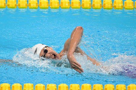 Fei Liwei of China is seen in action during the 19th Asian Games Swimming Men's 1500m Freestyle - Fast Heat held at the Hangzhou Olympic Sports Centre Aquatic Sports Arena in Hangzhou, China. Fei finished with a time of 14:55.47.