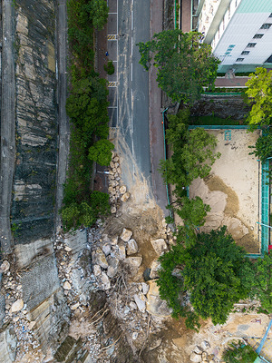 (EDITOR'S NOTE: Image taken with a drone)
An aerial view of the landslide that has closed Yiu Hing Road since early September. Nearly a month after heavy rains caused a landslide near Yiu Tung Estate in Shau Kei Wan, the Government of Hong Kong said it would be several more months before the road can be opened. Additional work was required to secure loose debris and to stabilize the large boulders still hanging off the slope. With another typhoon nearing Hong Kong, some are concerned more damage could be coming to this area.